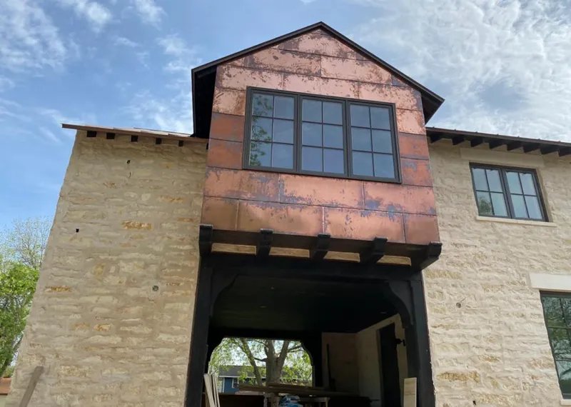 Copper metal panel facade on a stone building for Metal Roof Coating in The Dalles